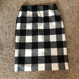 Black and white checkered skirt.